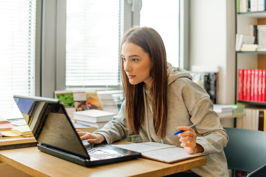Female student learning online